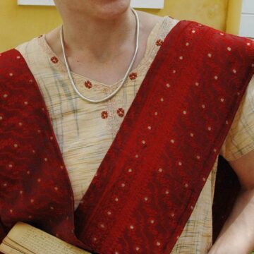 What inspired a professor from Germany to study Sangam literature?