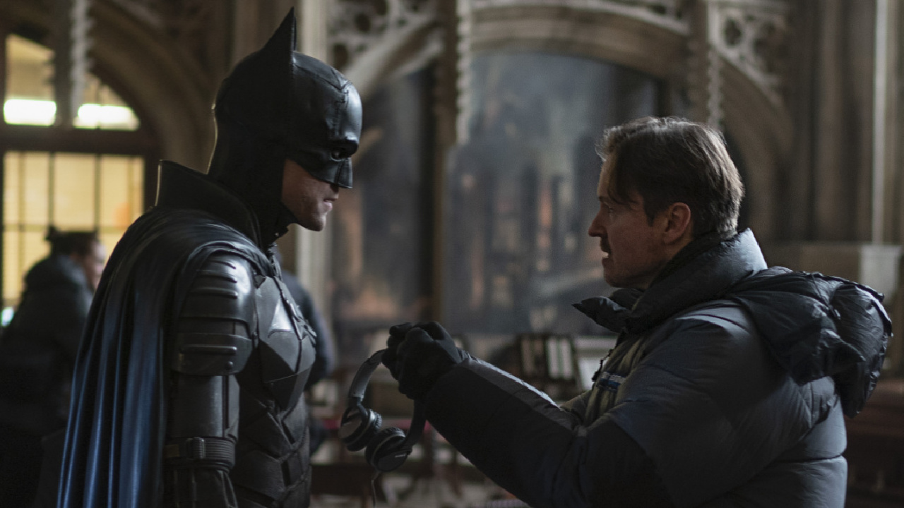 (L to R) Robert Pattinson and director Matt Reeves on the set in Warner Bros. Pictures’ action adventure 'The Batman,' a Warner Bros. Pictures release. Photo Credit: Jonathan Olley/™ & © DC Comics. Copyright: © 2021 Warner Bros. Entertainment Inc. All Rights Reserved.