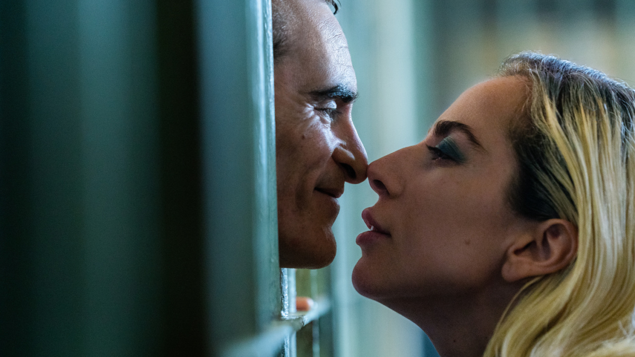 (L to R) Joaquin Phoenix as Arthur Fleck and Lady Gaga as Lee Quinzel in Warner Bros. Pictures’ 'Joker: Folie à Deux', a Warner Bros. Pictures release. Photo Credit: Niko Tavernise/™ & © DC Comics. Copyright: © 2024 Warner Bros. Ent. All Rights Reserved. TM & © DC.