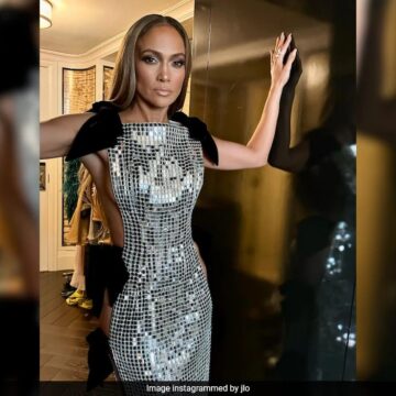 Jennifer Lopez Walks The Red Carpet In A “Revenge Dress”