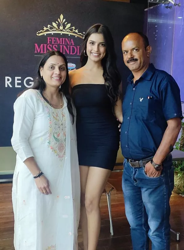 Nikita with her parents