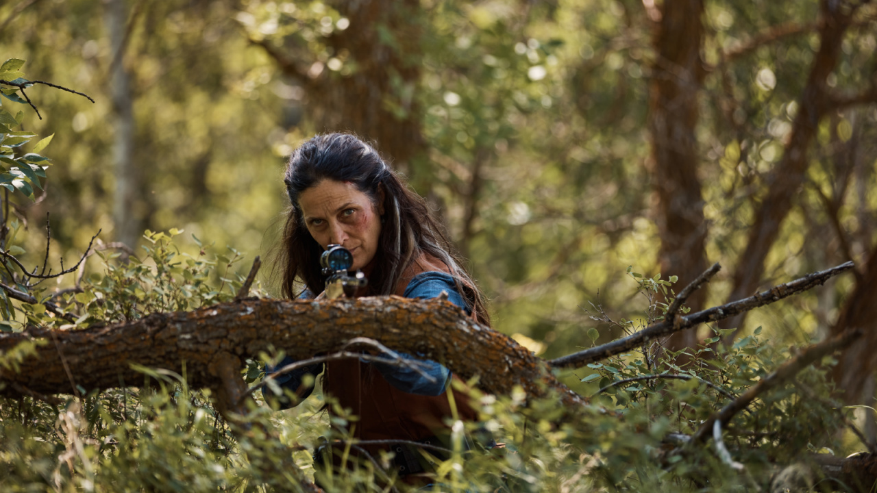 Carrie-Anne Moss as Mae in the Thriller, Horror 'Die Alone', a Quiver Distribution release. Photo courtesy of Quiver Distribution.