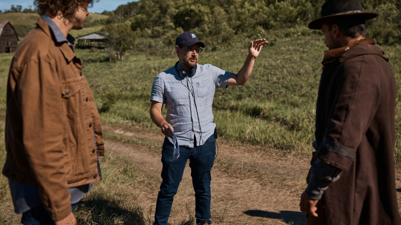 (L to R) Douglas Smith as Ethan, Director Lowell Dean and Frank Grillo as Kai in a BTS still from the Thriller, Horror 'Die Alone', a Quiver Distribution release. Photo courtesy of Quiver Distribution.