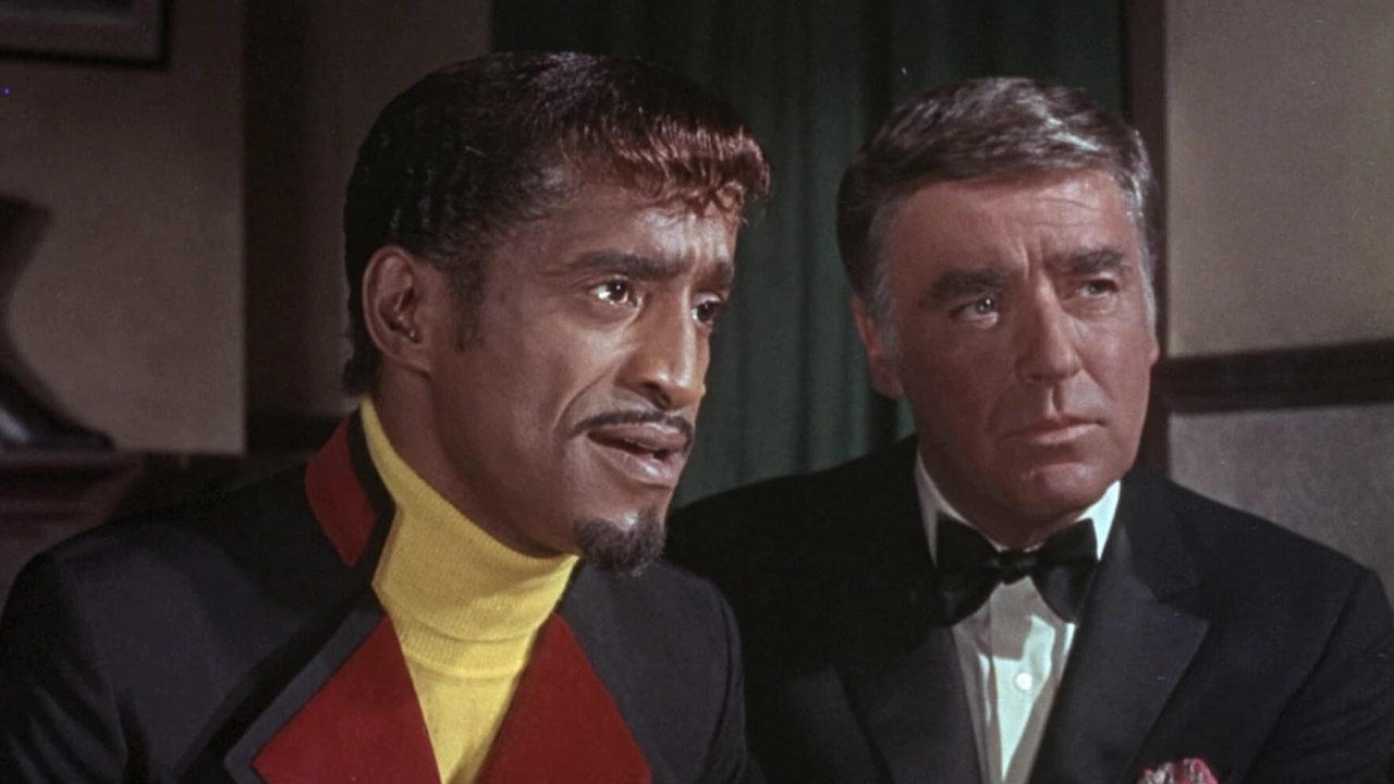 (L to R) Sammy Davis Jr. and Peter Lawford in 'Salt and Pepper'. Photo: United Artists.