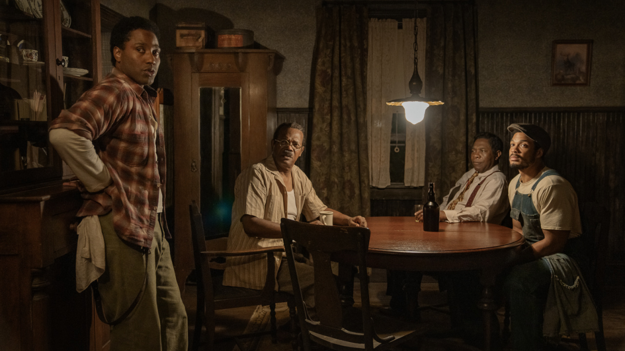 (L to R) John David Washington as Boy Willie, Samuel L. Jackson as Doaker Charles, Michael Potts as Wining Boy and Ray Fisher as Lymon in 'The Piano Lesson'. Photo: David Lee/Netflix © 2024.