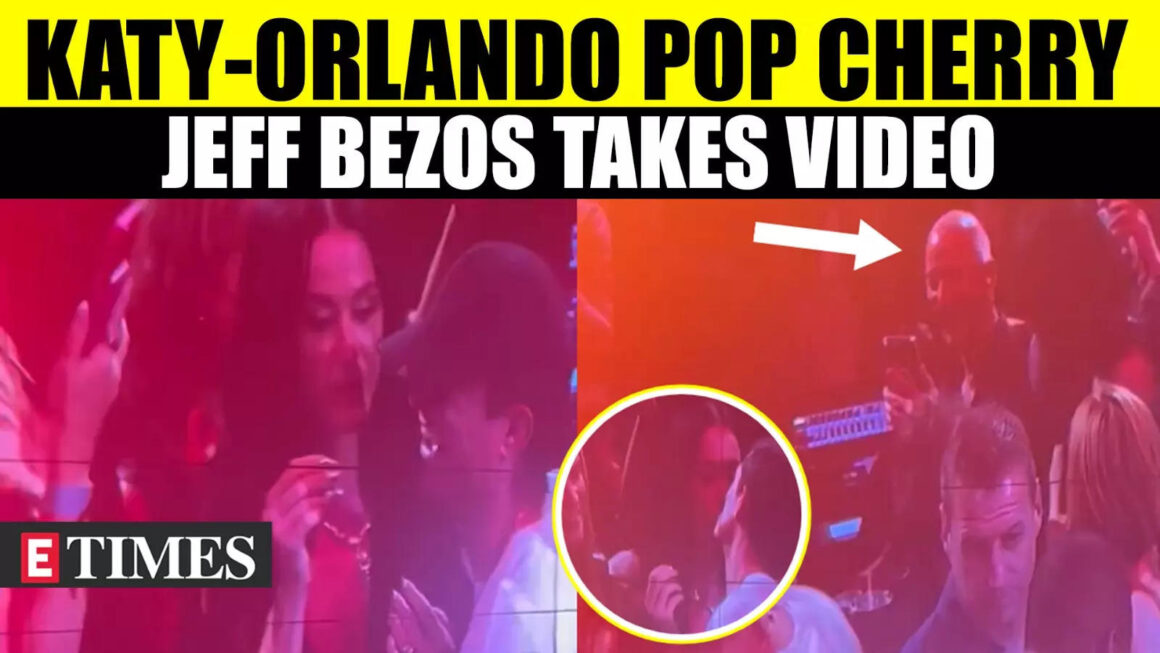 Katy Perry and Orlando Bloom Share Cherry At Usher’s Concert While Jeff Bezos Records Video