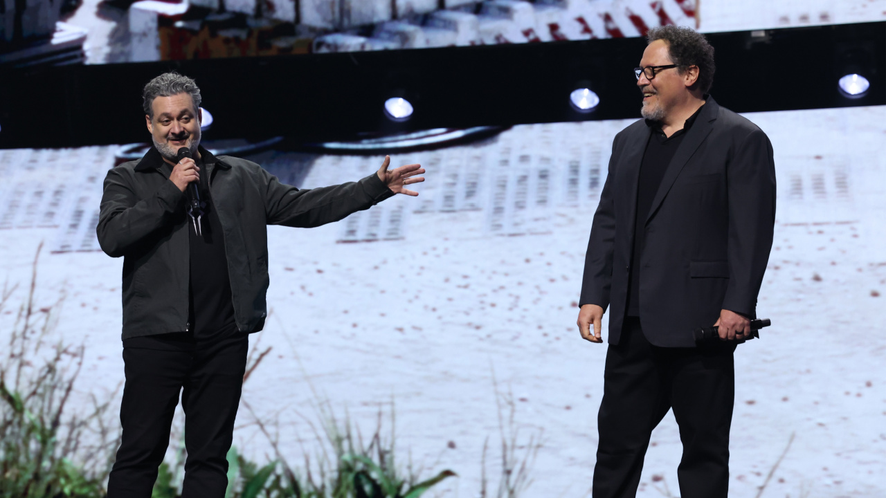 (L to R) Dave Filoni, Chief Creative Officer, Lucasfilm and Jon Favreau appears at the Disney Entertainment Showcase at D23: The Ultimate Disney Fan Event in Anaheim, California on August 09, 2024. Photo by Jesse Grant/Getty Images for Disney.