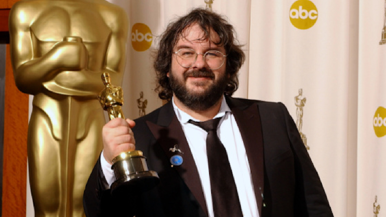 Peter Jackson, multiple Academy Award winner for his work on "The Lord of the Rings: The Return of the King," poses with one of his Oscars in the press room during the 76th Annual Academy Awards from the Kodak Theatre in Hollywood, CA on Sunday, February 29, 2004. Credit/Provider: HO. Copyright: AMPAS.