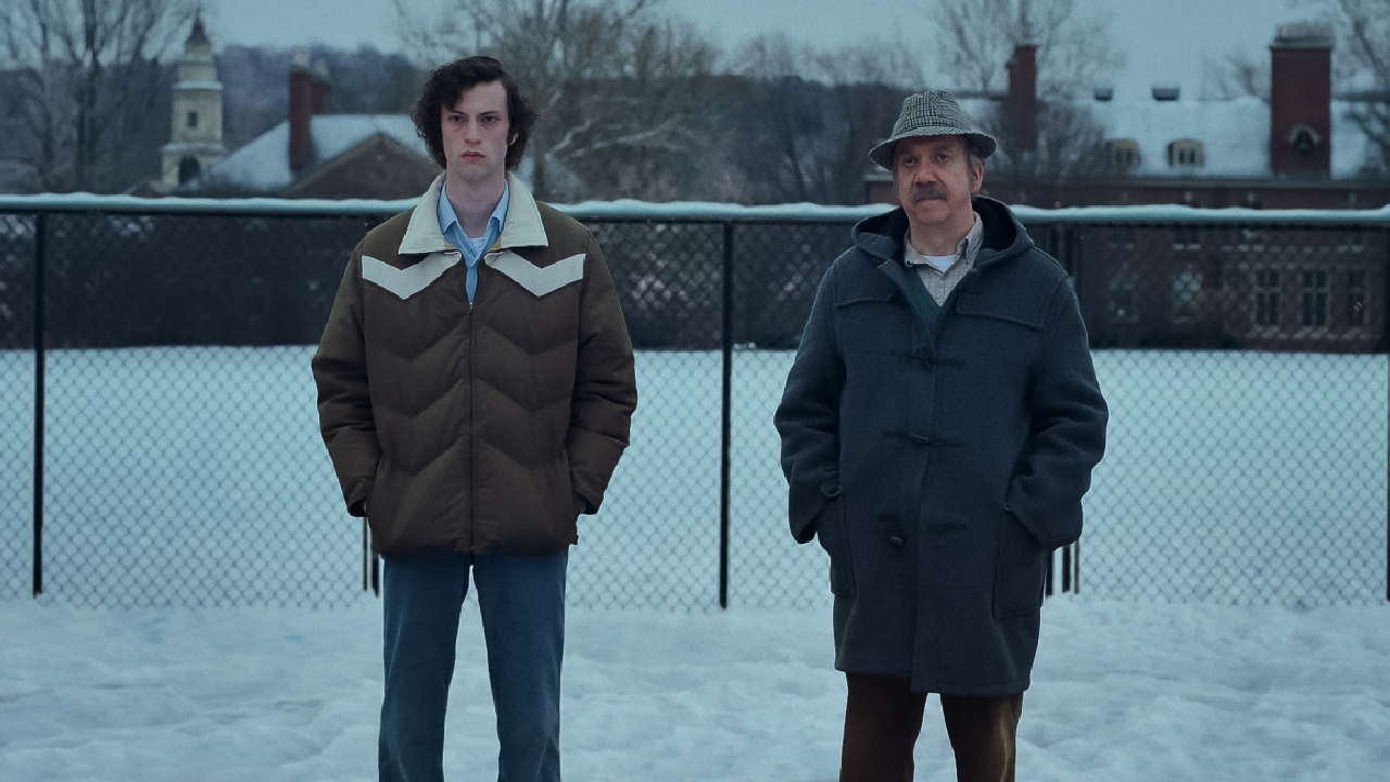 (L to R) Dominic Sessa stars as Angus Tully and Paul Giamatti as Paul Hunham in director Alexander Payne’s 'The Holdovers,' a Focus Features release. Credit: Courtesy of FOCUS FEATURES / © 2023 FOCUS FEATURES LLC.