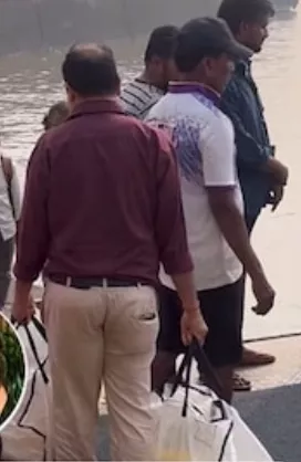 Staff carrying flowers