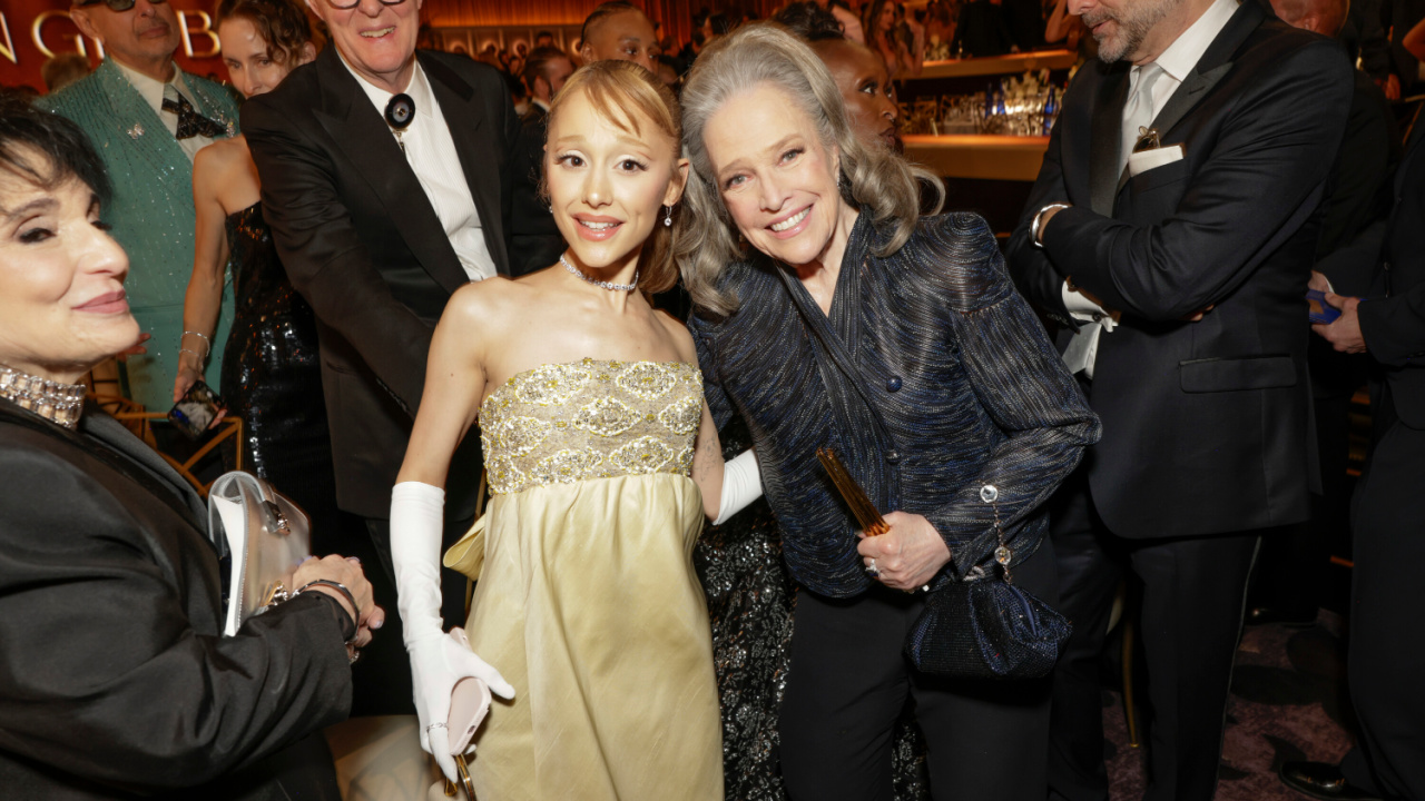 (L to R) Ariana Grande and Kathy Bates at the 82ND Annual Golden Globes®, airing live from the Beverly Hilton in Beverly Hills, California on Sunday, January 5, 2025 at 8 PM ET/5 PM PT, on CBS and streaming on Paramount+. Photo: Francis Specker/CBS ©2025 CBS Broadcasting, Inc. All Rights Reserved.