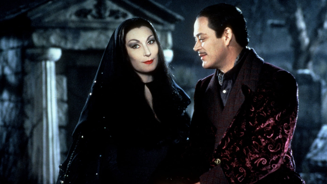 (L to R) Anjelica Huston and Raul Julia in 'The Addams Family'. Photo: Paramount Pictures.